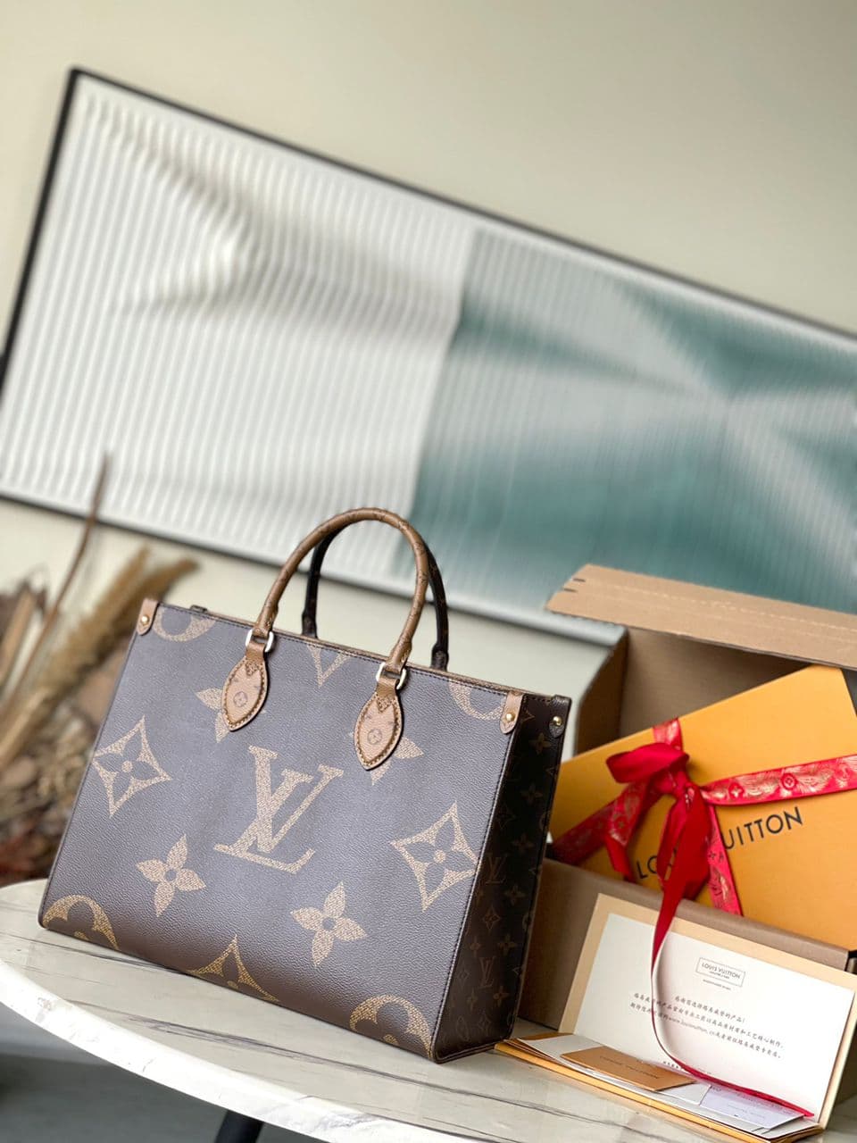 LV OnTheGo Reverse Monogram – Moda
