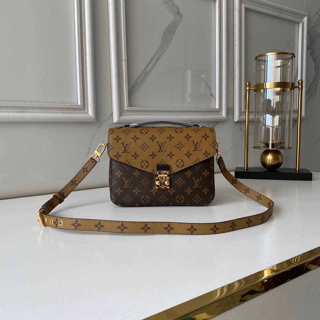 Pochette Métis Monogram Reverse – Moda