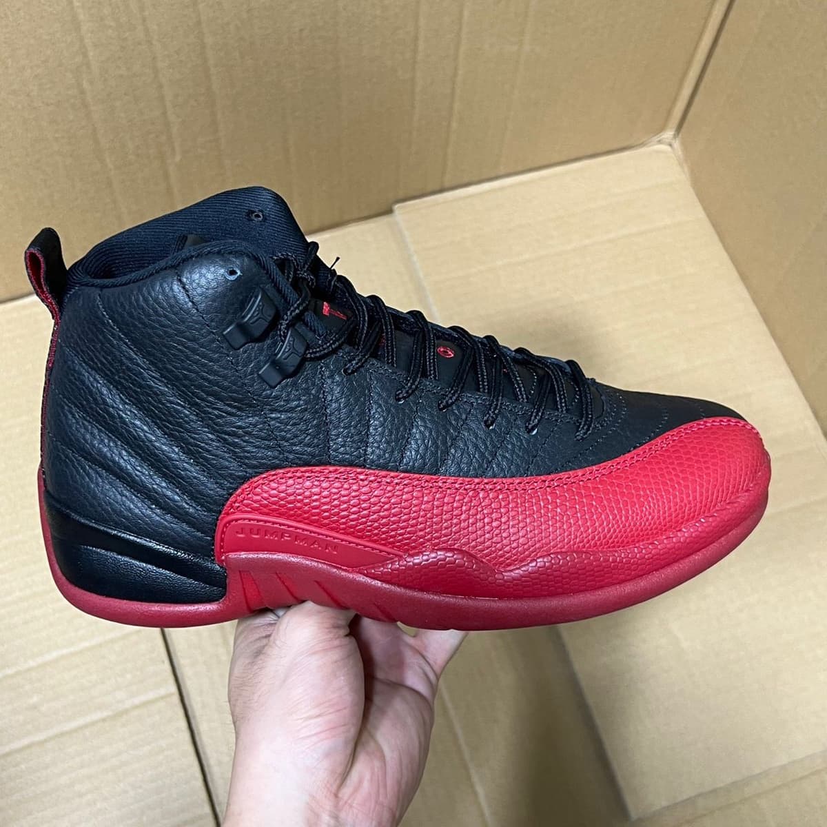 Air Jordan 12 Retro "Flu Game" (Varsity Red) .