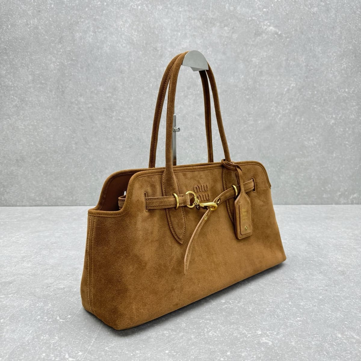 Bolsa Miu Miu Aventure em camurça