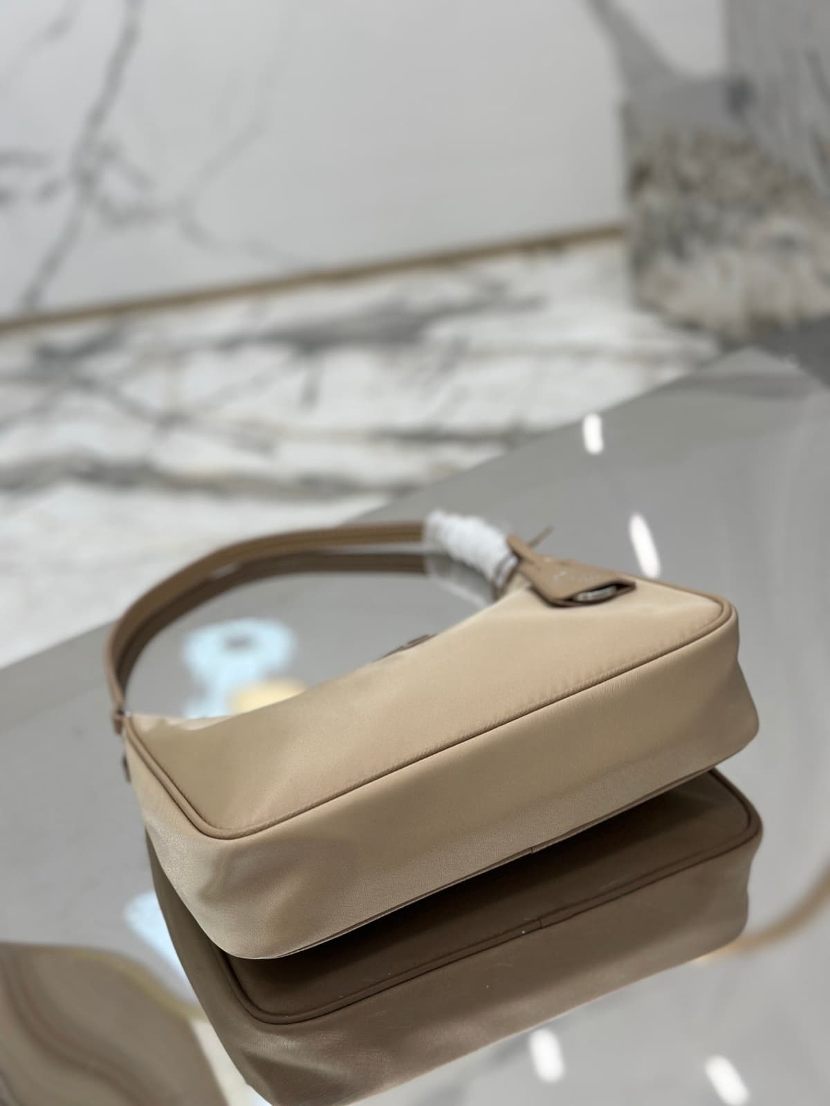 Bolsa Prada mini Re-Edition 2000