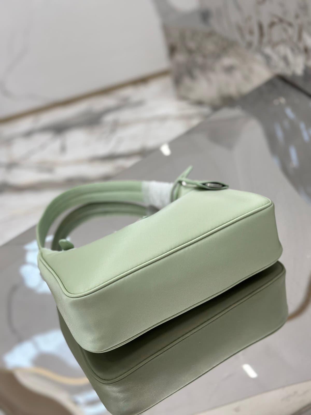 Bolsa Prada mini Re-Edition 2000