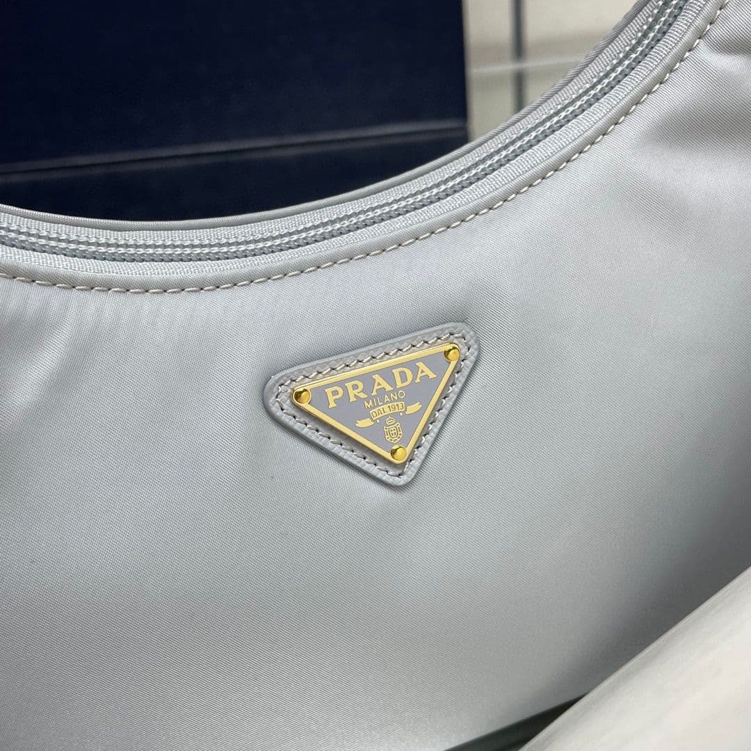 Bolsa Prada mini Re-Edition 2000
