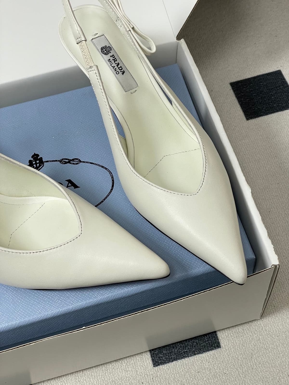 Prada Slingback Pumps White
